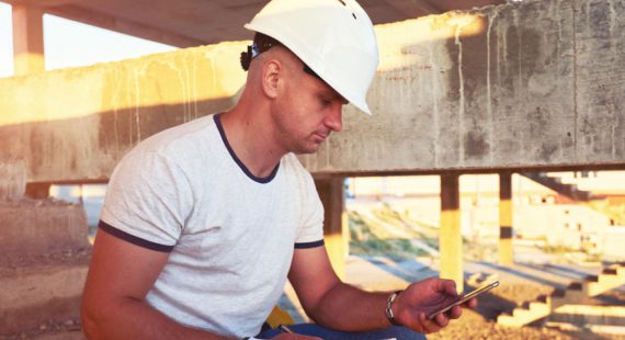 construction worker useing citizen portal app, feature of our Land Management Software