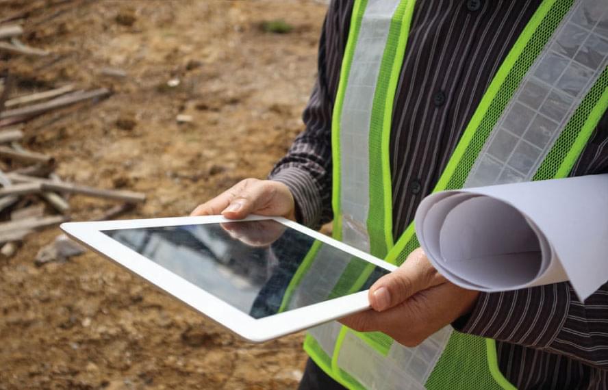 field worker holding ipad