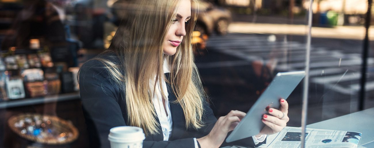 Woman looking at tablet